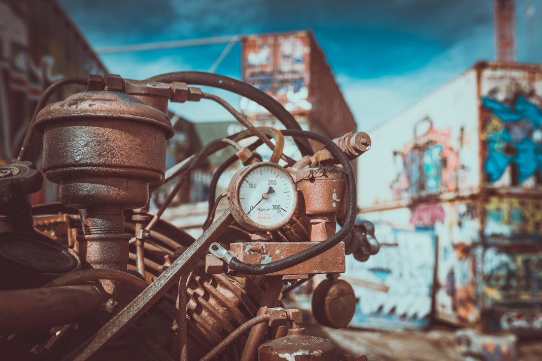 selective focus photo of white and gray manifold gauge